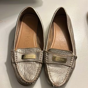Gold slip on shoes